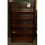 An oak open bookcase, 77cm by 30cm by 137cm, a G Plan style nest of three tables and a mid 20th