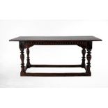 A Mid 17th Century Joined Oak Refectory Dining Table, of plank top construction with cleated ends