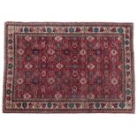 Tabriz Carpet Iranian Azerbaijan, circa 1950 The blood red field with an allover design of