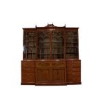 A George III Mahogany, Tulipwood Banded Four-Door Breakfront Library Bookcase, early 19th century,