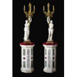 A Pair of French Ormolu-Mounted, White Marble and Porphyry Candelabra, signed Joan F.R. Lorta,