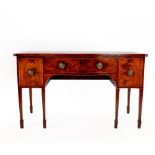 A George III Mahogany Crossbanded and Barber's Pole Strung Serpentine Shaped Sideboard, late 18th