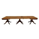 A Mahogany Triple Pillar Dining Table, 2nd quarter 19th century, the plain frieze on turned supports