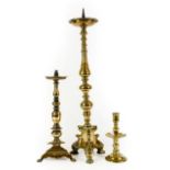 A Brass Altar Pricket Candlestick, in 17th century style, with circular drip pan on multiple knopped