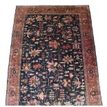 Oriental Carpet of Heriz Design, 2nd half 20th century The indigo field with an allover design of