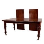 A Victorian Mahogany Extending Dining Table, circa 1870, with three additional leaves, the moulded