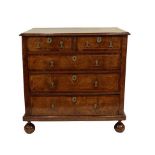 A Late 17th Century Walnut and Tracery Strung Chest of Drawers, the moulded top above two short