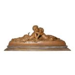 After Joseph D'Aste (1881-1945): A Terracotta Bacchic Group, as two recumbent children embracing, on