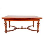 A Late 19th Century French Walnut Extending Dining Table, the quarter-veneered and crossbanded