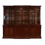 A Victorian Mahogany Library Breakfront Bookcase, circa 1880, the moulded cornice above four doors