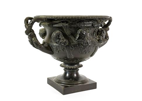 After the Antique: A Bronze Warwick Vase, of typical form, on a square plinth, 34cm wide Having been