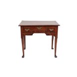 A George I Walnut, Crossbanded and Featherbanded Dressing Table, early 18th Century, with three