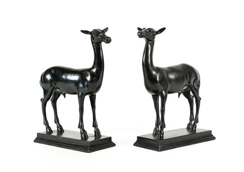 After the Antique: A Pair of Bronze Figures of Daini, standing four-square on rectangular bases,