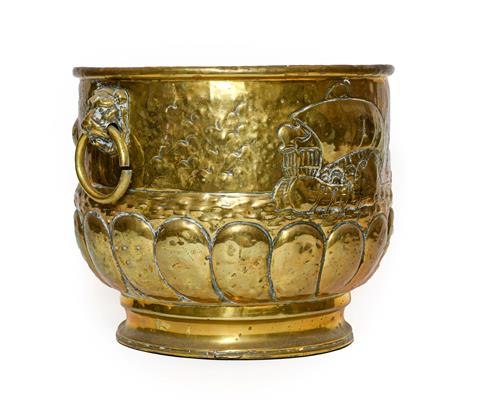 A Dutch Brass Log Bin, late 19th/early 20th century, of cylindrical form with mask and ring