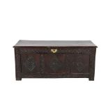 A Late 17th Century Joined Oak Chest, the hinged lid enclosing a vacant interior above a guilloche