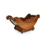A George IV Mahogany Cheese Coaster, of traditional form with scroll crestings, turned handles and