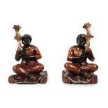 A Pair of Late 19th Century Polychrome Decorated Italian Blackamoor Figures, each modelled as a male