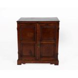 A Victorian Oak Cabinet, incorporating 18th century elements, the moulded top above two cupboard