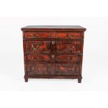 A Late 17th Century Geometric Moulded Oak Chest, the moulded top above four two-as-one drawers, on