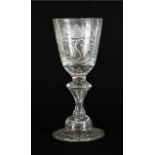 A Wine Glass, circa 1730, the rounded funnel bowl engraved with a crowned GS monogram within a
