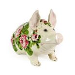 A Wemyss Pottery Pig, early 20th century, naturalistically modelled seated, painted with pink roses,