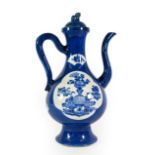 A Chinese Porcelain Ewer and Cover, Kangxi, of pear form with scroll handle and spout, painted in