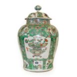 A Chinese Porcelain Baluster Jar and Cover, Kangxi, painted in famille verte enamels with baskets of