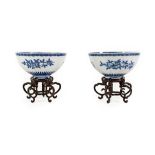 A Pair of Chinese Porcelain Bowls, possibly Qianlong, painted in underglaze blue with fruit and