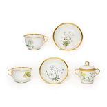 A Pair of Chamberlains Worcester Botanical Breakfast Cups and Saucers, circa 1800, decorated with