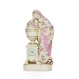 A Derby Porcelain Figure of Andromache, circa 1780, beside an urn containing the ashes of Hector, on