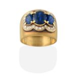 A Sapphire and Diamond Triple Cluster Ring, three graduated oval cut sapphires within a border of