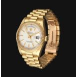 An 18 Carat Gold Automatic Day/Date Centre Seconds Wristwatch, signed Rolex, Oyster Perpetual,