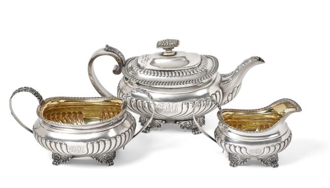 A Three-Piece George III and George IV Silver Tea-Service, The Teapot Maker's Mark Worn, London,
