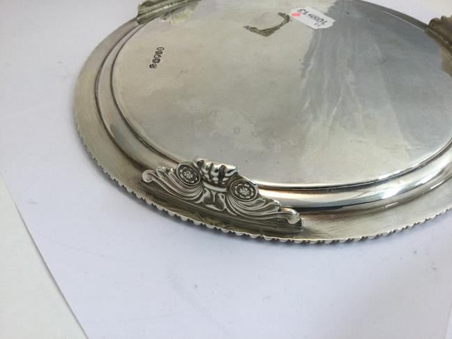 A George III Silver Salver, by John Mewburn, London, 1824, circular and on three scroll and paw cast - Image 4 of 5