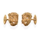 A Pair of 18 Carat Gold Cufflinks, realistically modelled as masks, with swivel bars, measure 2.