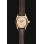 A Lady's 9 Carat Gold Automatic Wristwatch, signed Rolex, model: Oyster Perpetual, ref: 6509,