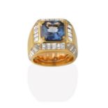 A Contemporary Blue Spinel and Diamond Ring, the square mixed cut blue spinel in a yellow claw
