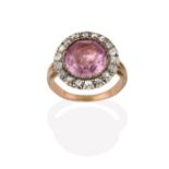 A Georgian Pink Topaz and Diamond Cluster Ring, the round cut pink topaz, in a yellow claw