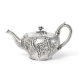 A William IV Silver Teapot, by Benjamin Smith, London, 1836, tapering cylindrical and chased with