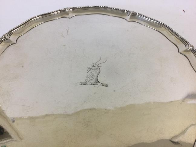 A George III Silver Salver, Probably by John Carter, London, 1774, shaped circular and on four - Image 2 of 5