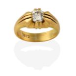 A Diamond Solitaire Ring, the round brilliant cut diamond in a yellow double claw setting, to a