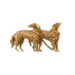 A Dog Brooch, realistically modelled as two standing dogs, with yellow textured hair and a trace