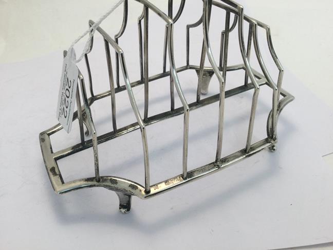 A George III Silver Toast-Rack, by Michael Plummer, London, 1792, shaped oblong and on four panel - Image 4 of 5