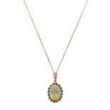 A 9 Carat Gold Opal Pendant on Chain, the oval opal in a yellow claw setting, on a fine trace link