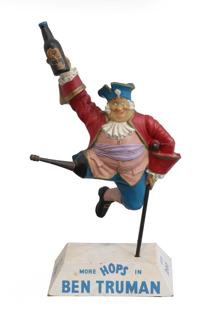 Ben Truman Advertising Figure soft plastic pirate holding a bottle aloft on wooden stand 'More