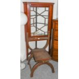 ~ A 19th century mahogany standing corner cupboard, astragal glazed and with satinwood banding, 80cm