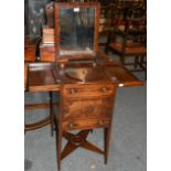 A George III mahogany wash stand the top opening to reveal a fitted interior with a lift out