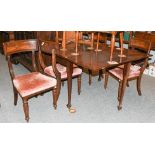 A 19th century mahogany drop leaf dining table (alterations) together with a set of four Regency