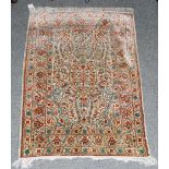 Hereke silk prayer rug, the ivory field with issuing flowers beneath the Mihrab framed by upper