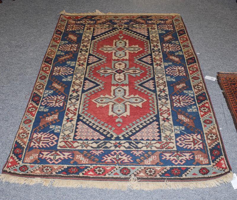 An Afghan Baluch rug the field with columns of barber poles beneath the Mihrab enclosed by triple - Image 5 of 6